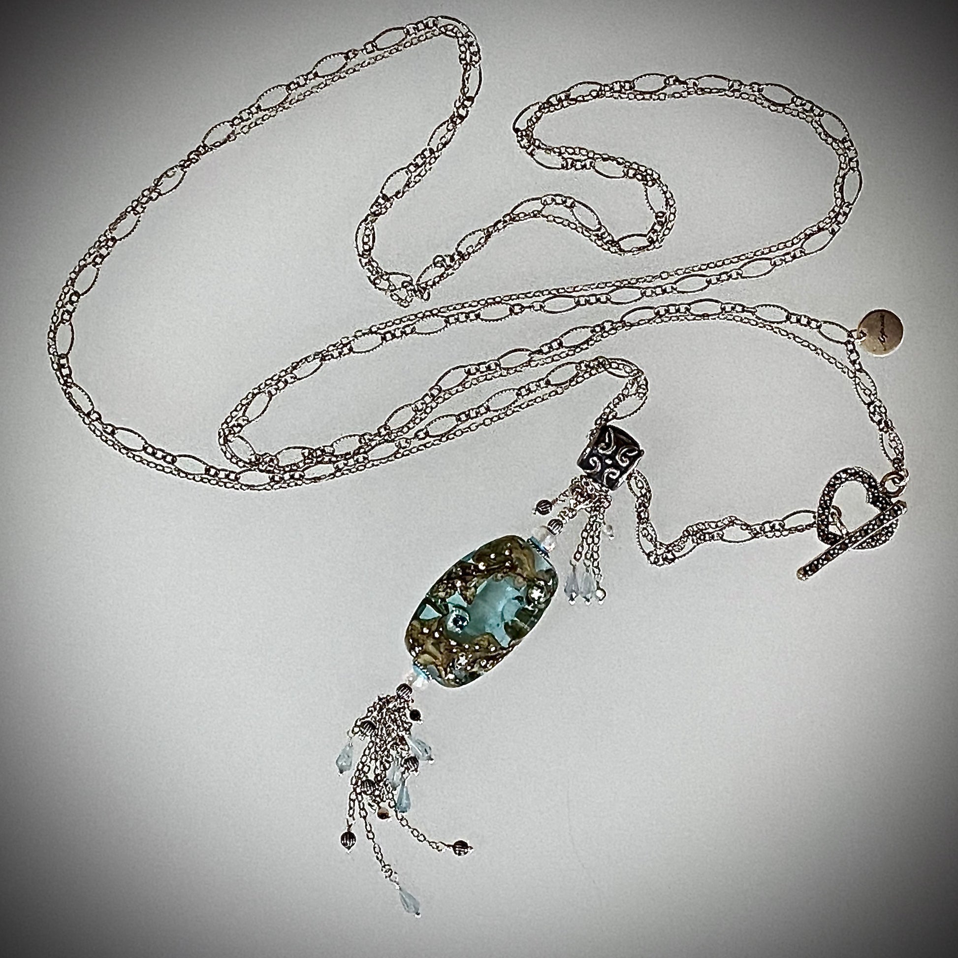 Full View Ezili beachlove glass silver tassel pendant necklace / Arpaia