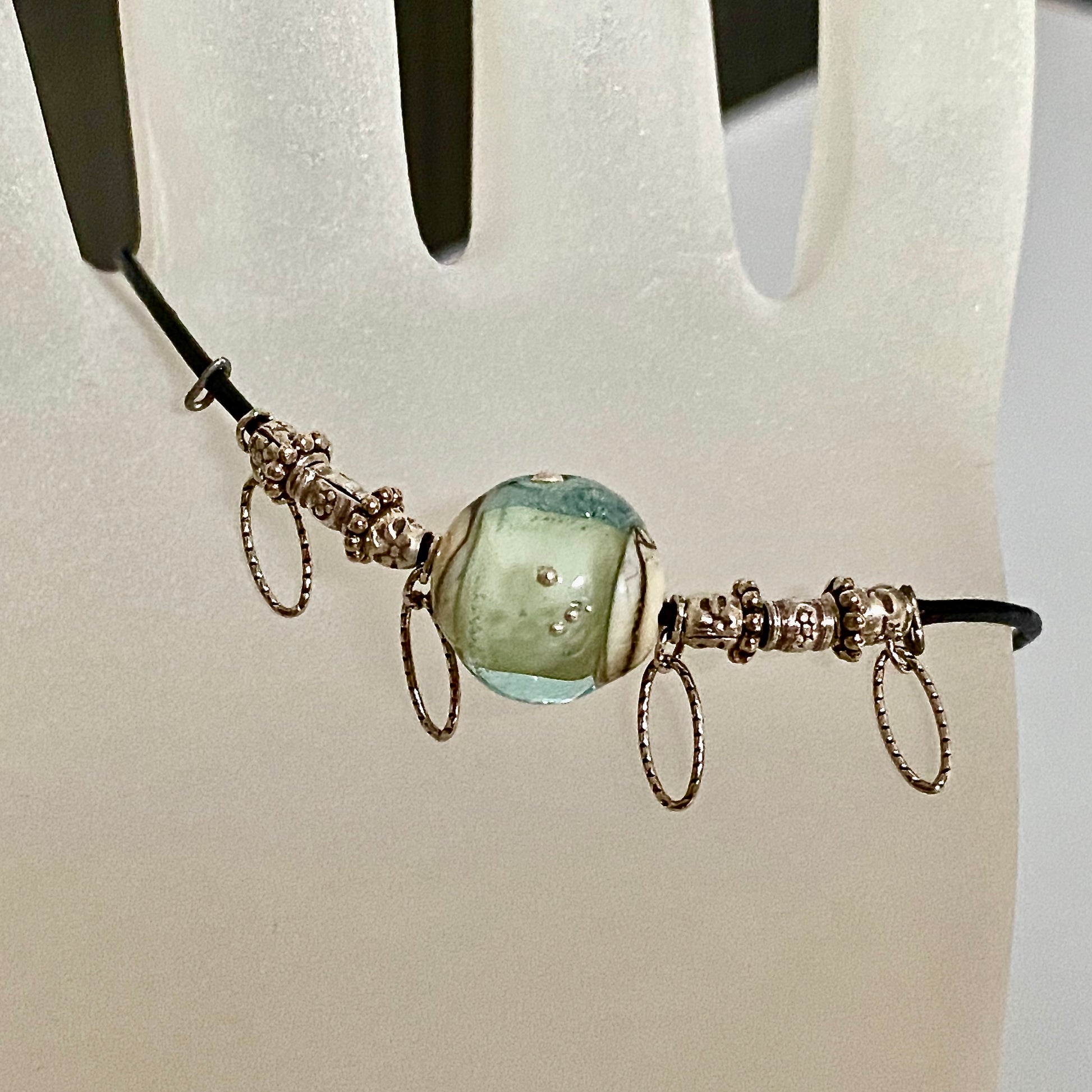 Closeup handmade ocean & beach motif glass bead / Rockport bracelet / Arpaia beachlove