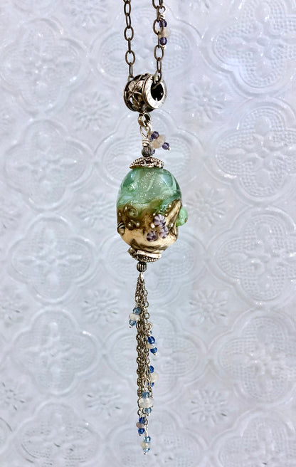 Side view of Seven Seas Pendant / Arpaia beachlove necklace