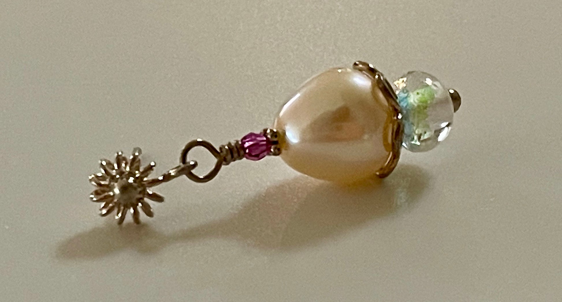 A single earring in the pair 